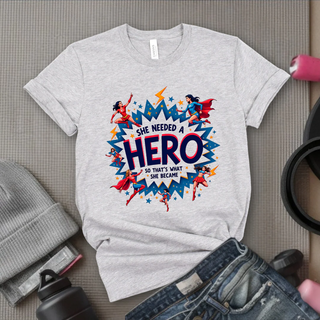 She Needed A Hero - Unisex Jersey Short Sleeve Shirt - Gift for Yourself - Bella Canvas 3001